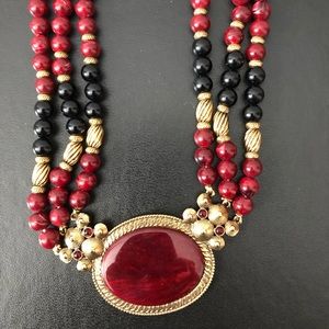 1928 Maroon, black, and gold beaded necklace